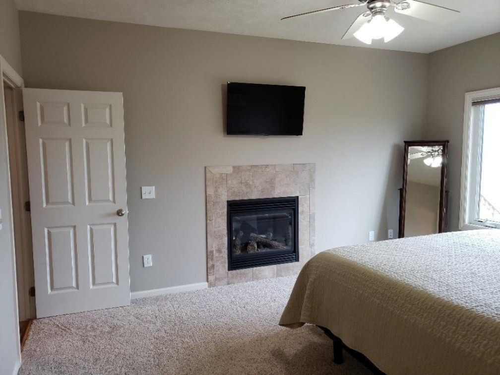 6970 Farr Road Nunica, MI 49448 - Photo 18 of 34 Master Suite Fireplace