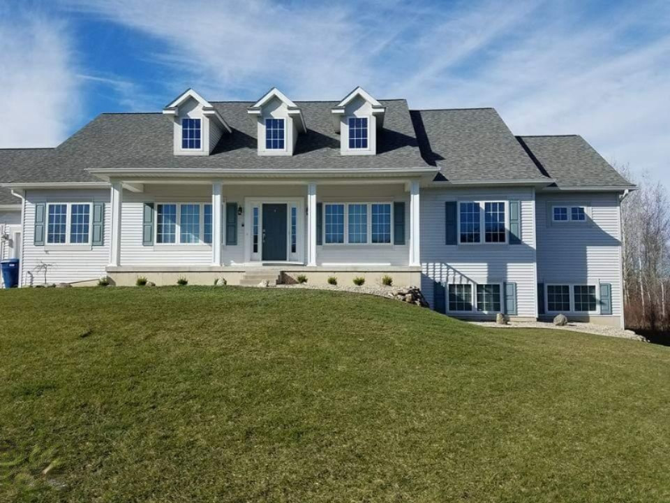 6970 Farr Road Nunica, MI 49448 - Photo 2 of 34 Front View Of This Significant Home