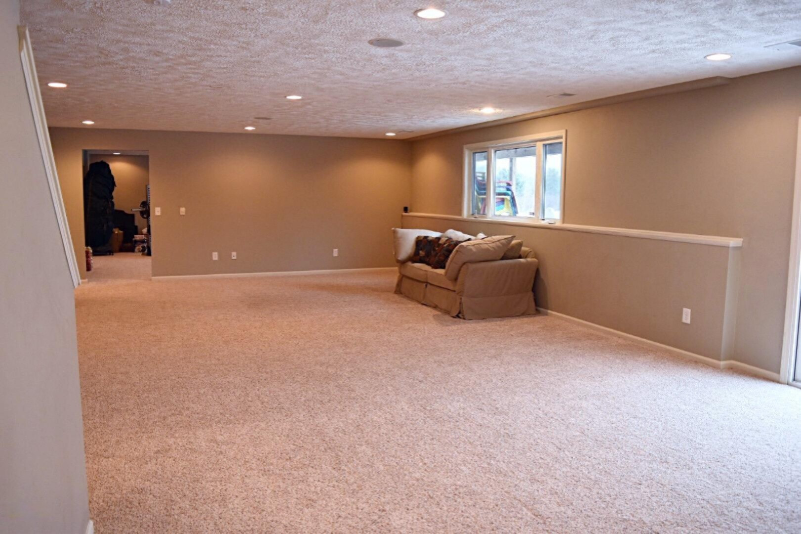 6970 Farr Road Nunica, MI 49448 - Photo 32 of 34 Bright Walk Out Level Famiky Room
