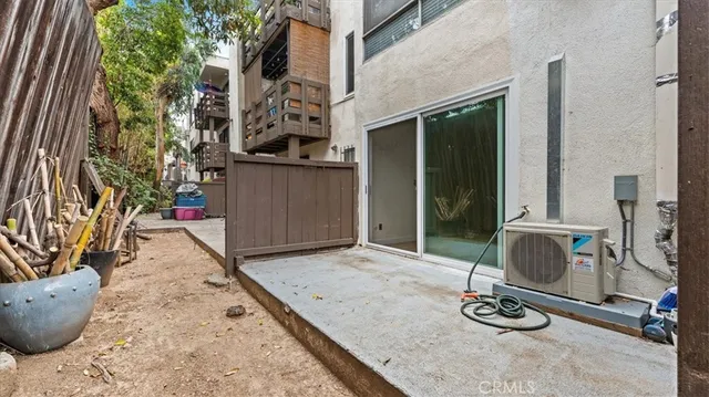 a room with gym equipment and a mirror