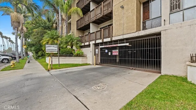 an aerial view of a building with outdoor space