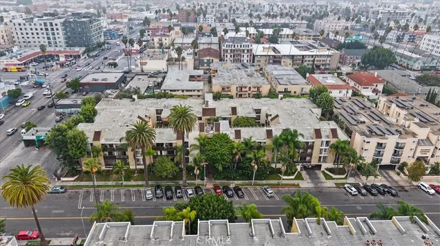 an aerial view of a city with houses