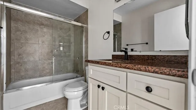 a front view of a house with parking area