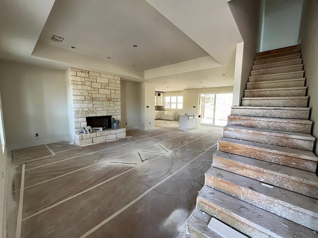 317 Jonny Boy Way Springtown, TX 76082 - Photo 6 of 7 a view of empty room with wooden floor and fan