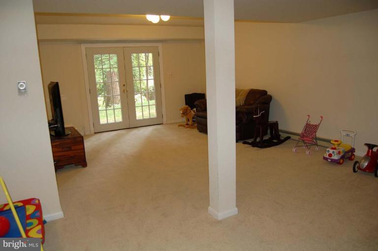 7721 Falstaff Road McLean, VA 22102 - Photo 26 of 27 WALK OUT BASEMENT TO PARK LIKE BACK YARD