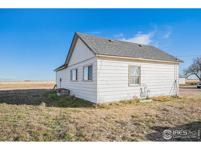 a house view with a backyard space