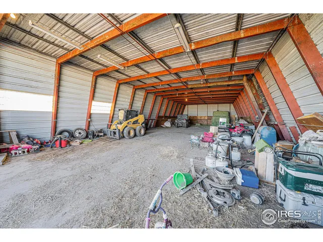 a view of a room with a fireplace