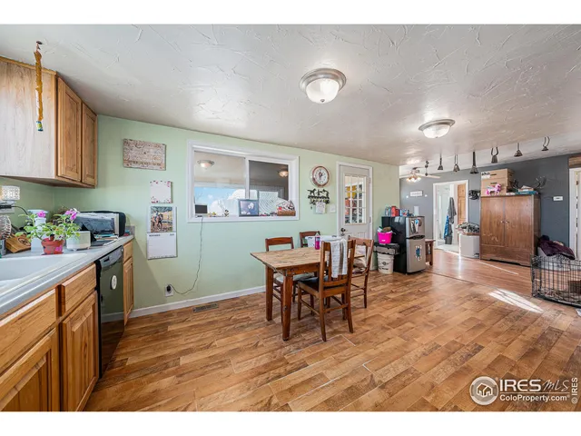 a view of a kitchen and dining room