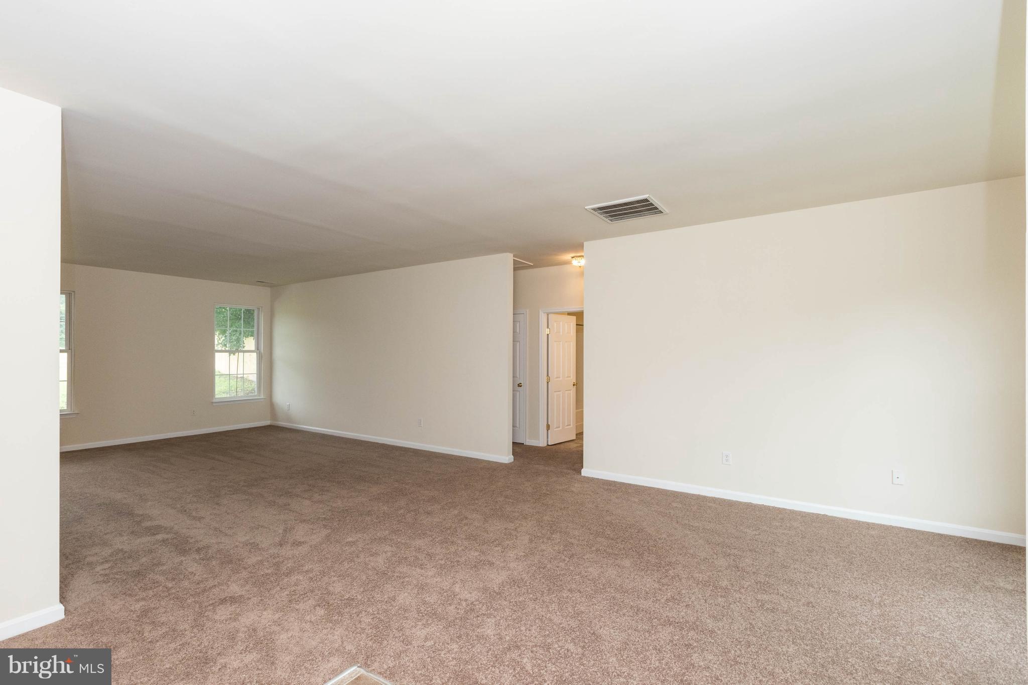 11207 Rawhide Road Lusby, MD 20657 - Photo 2 of 25 a view of an empty room