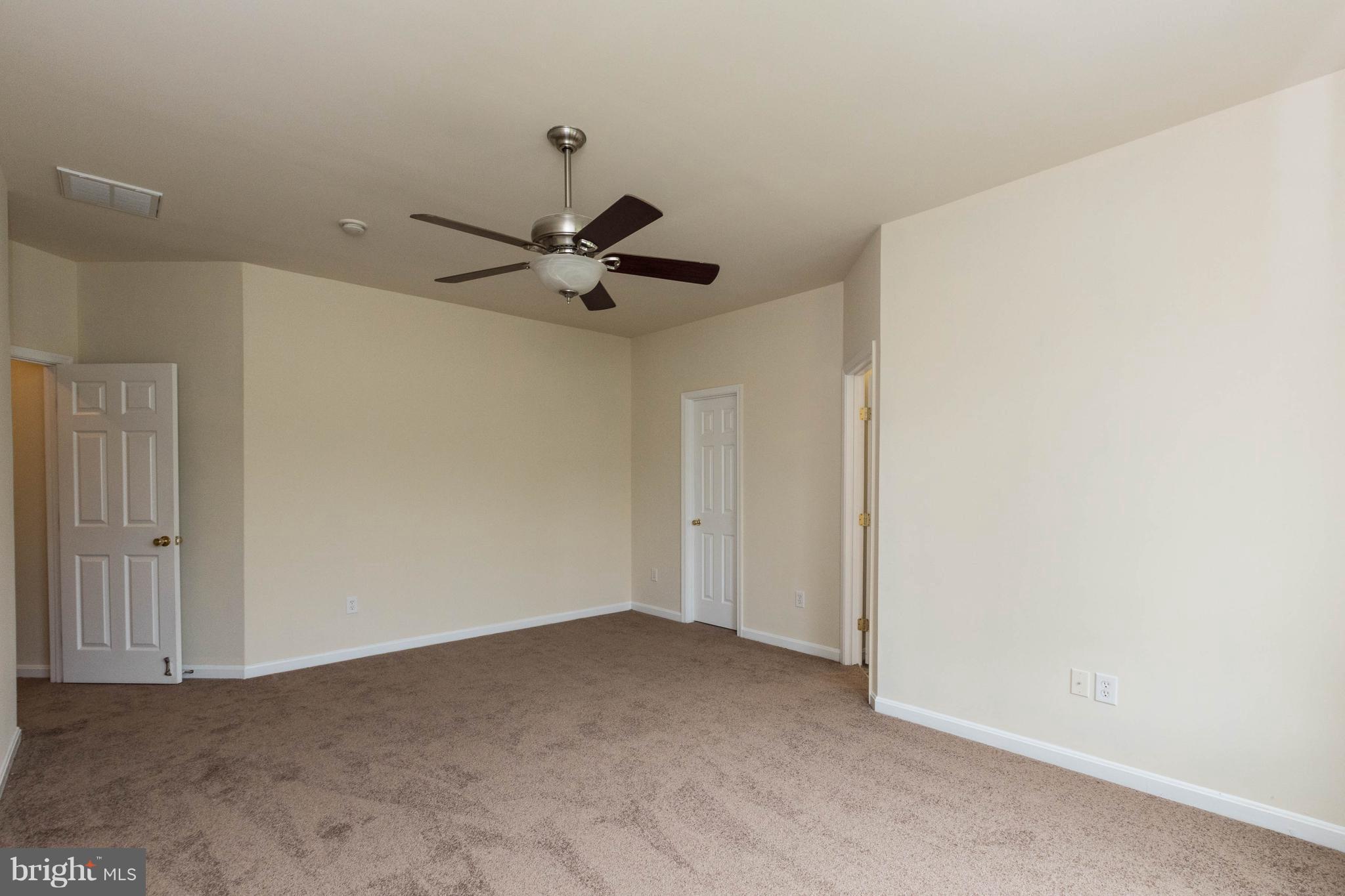 11207 Rawhide Road Lusby, MD 20657 - Photo 14 of 25 a view of a big room with carpet