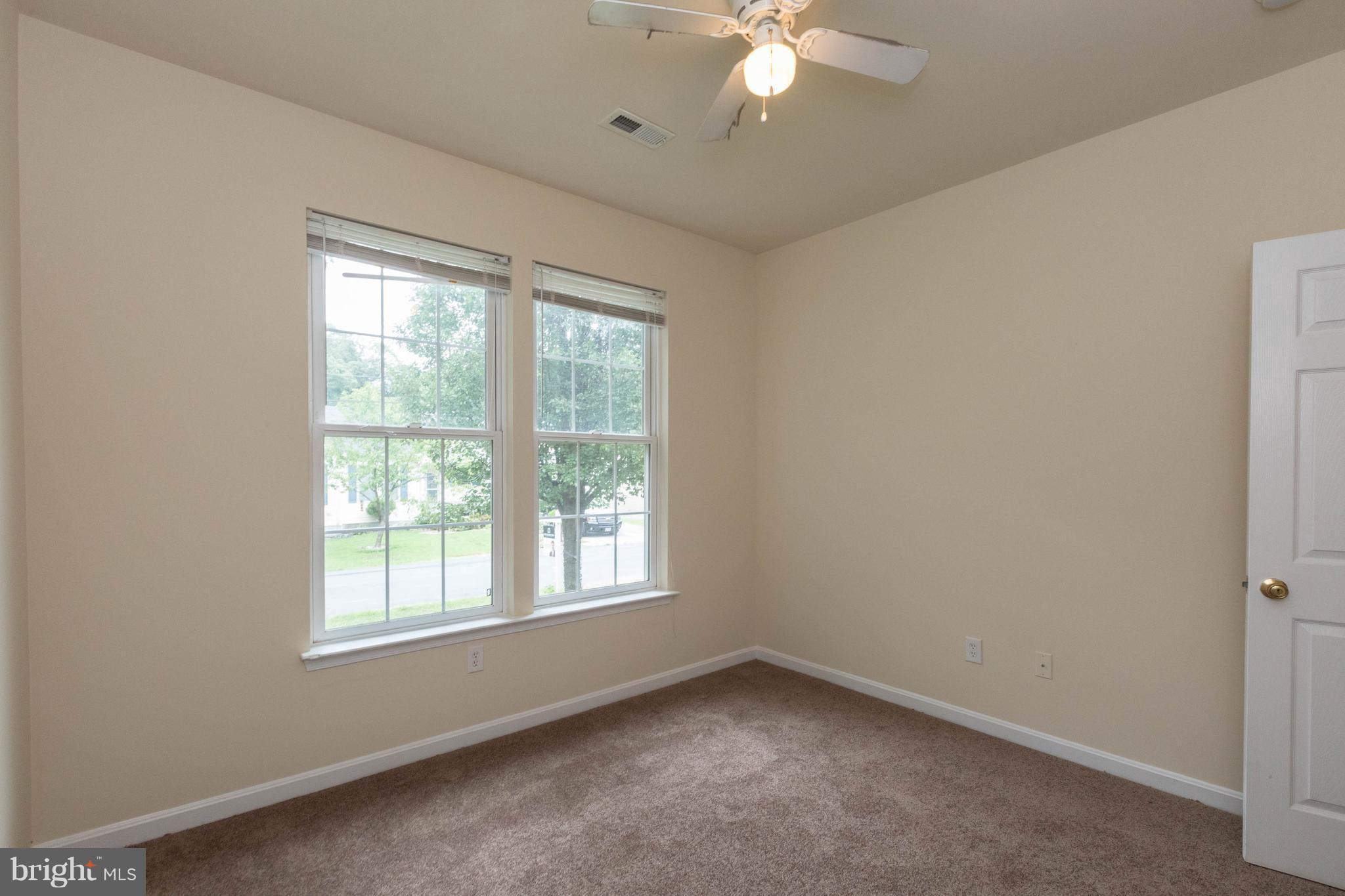 11207 Rawhide Road Lusby, MD 20657 - Photo 17 of 25 an empty room with a window