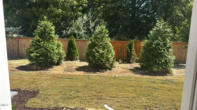 a bathroom with a sink double vanity and a mirror