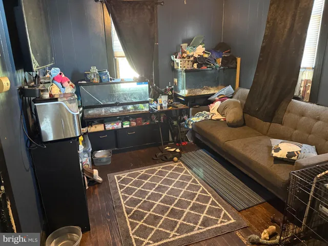 a kitchen with stainless steel appliances granite countertop a stove and cabinets