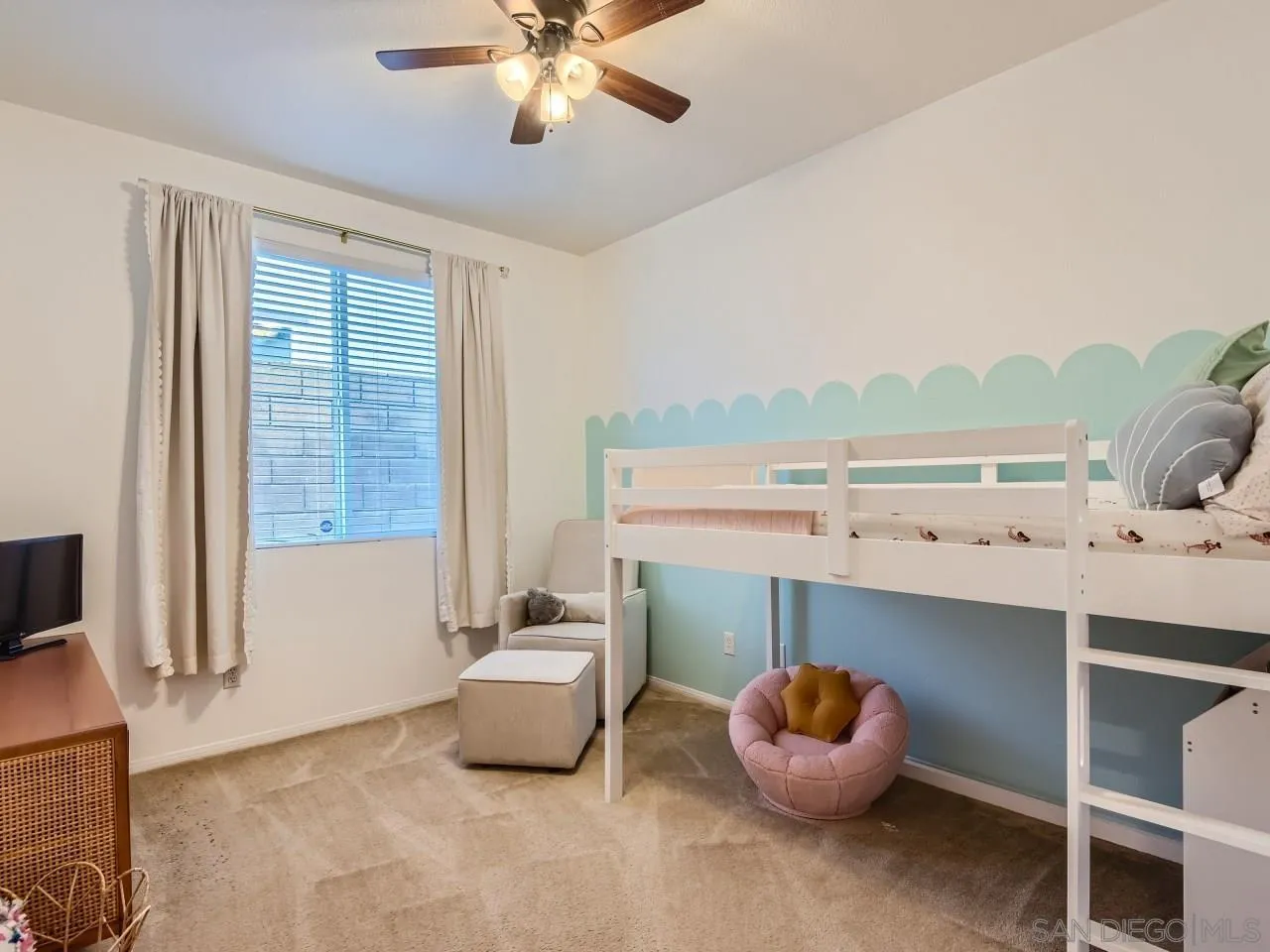 31183 Tiverton Road Menifee, CA 92584 - Photo 19 of 25 a living room with furniture and a large window