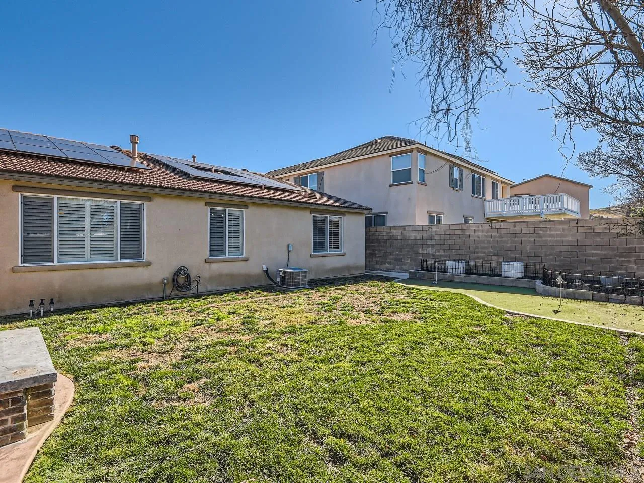 31183 Tiverton Road Menifee, CA 92584 - Photo 24 of 25 a house view with a outdoor space