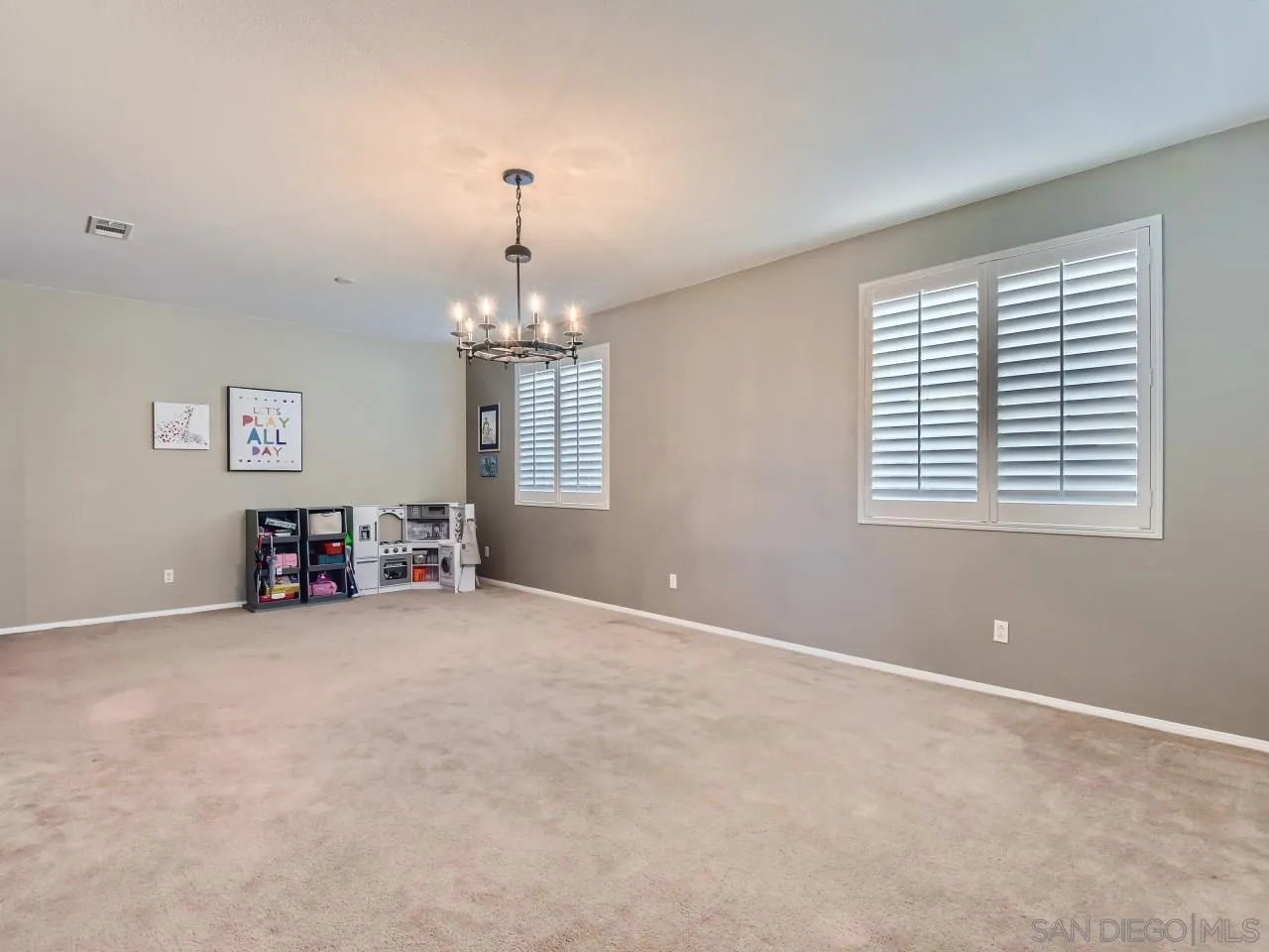 31183 Tiverton Road Menifee, CA 92584 - Photo 6 of 25 a view of a livingroom with a window
