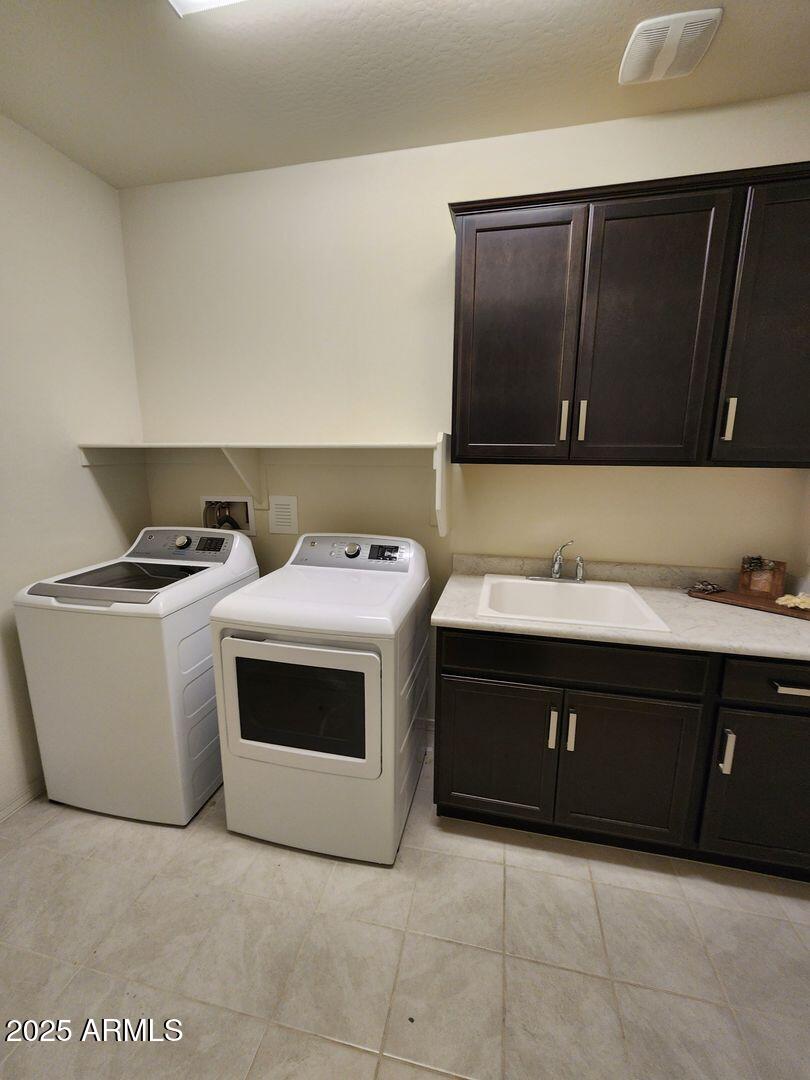 7198 West Bajada Road Peoria, AZ 85383 - Photo 11 of 36 a utility room with washer and dryer