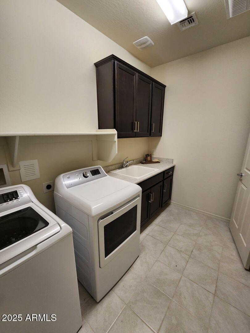 7198 West Bajada Road Peoria, AZ 85383 - Photo 12 of 36 a utility room with dryer and washer
