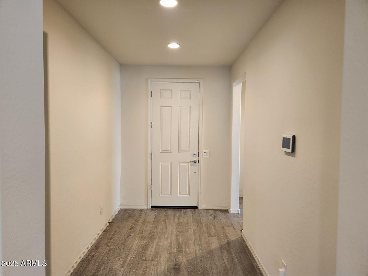 7198 West Bajada Road Peoria, AZ 85383 - Photo 18 of 36 a view of a hallway with wooden floor