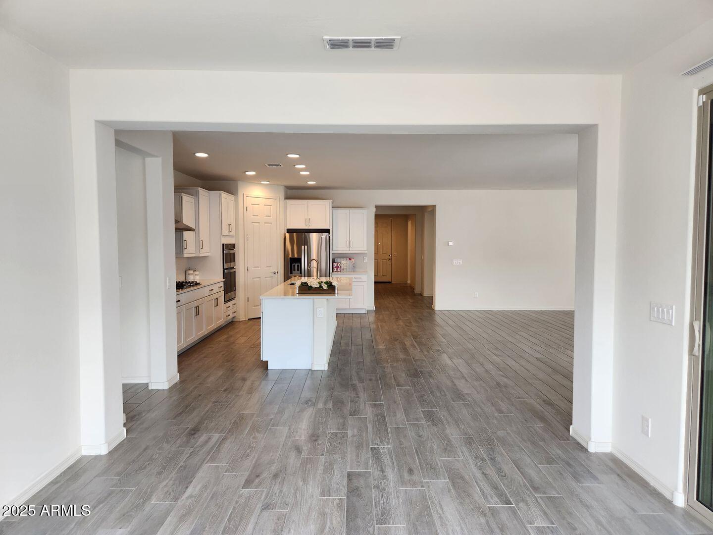 7198 West Bajada Road Peoria, AZ 85383 - Photo 26 of 36 a view of kitchen and wooden floor