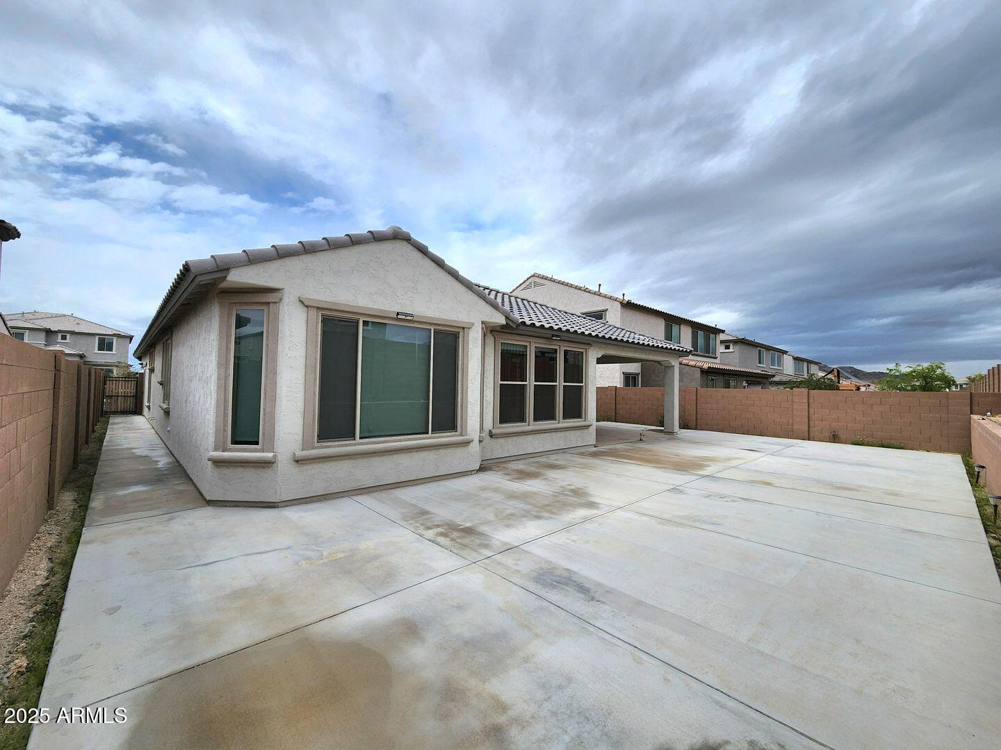7198 West Bajada Road Peoria, AZ 85383 - Photo 35 of 36 a front view of a house with a garden