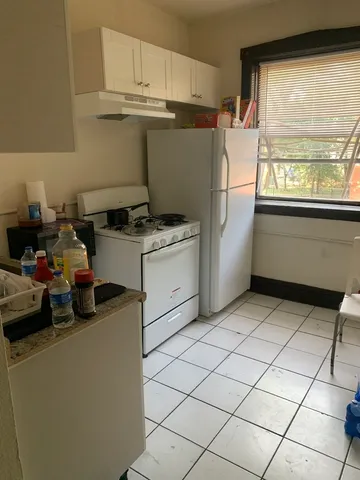 a view of balcony with furniture