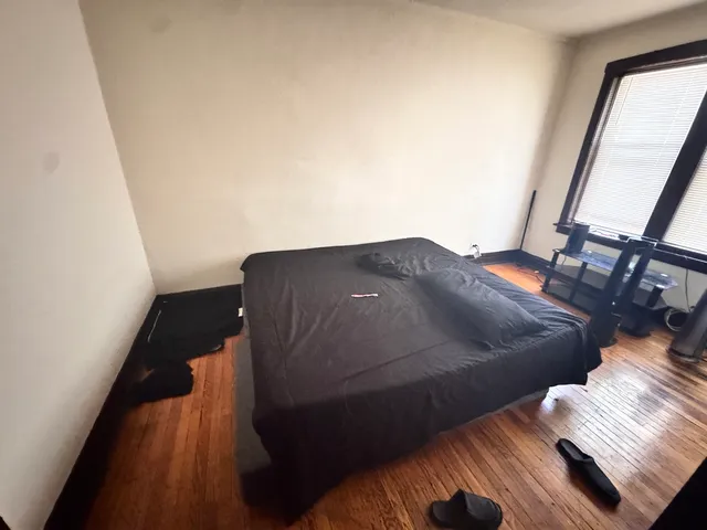 a bathroom with a sink a toilet and tub