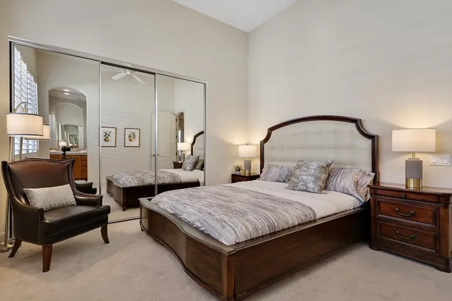 a bathroom with a double vanity sink toilet and shower