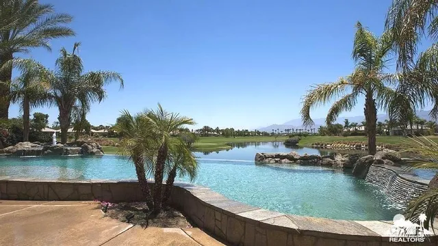 a view of lake with green space