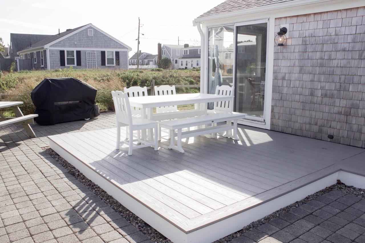 4 Beach Road West Dennis, MA 02670 - Photo 16 of 22 a view of a back yard from a patio
