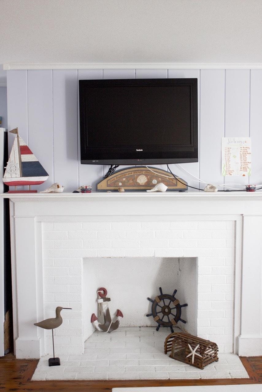 4 Beach Road West Dennis, MA 02670 - Photo 8 of 22 a living room with furniture and a flat screen tv