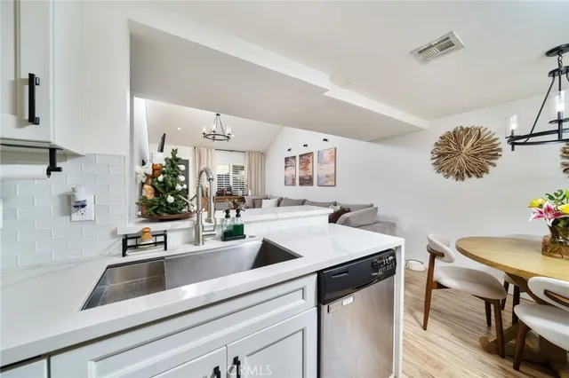 a view of entryway with washer and dryer