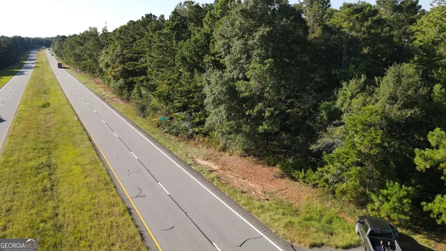 a view of swimming pool from a balcony