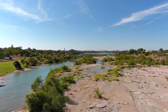 a view of a lake with beach
