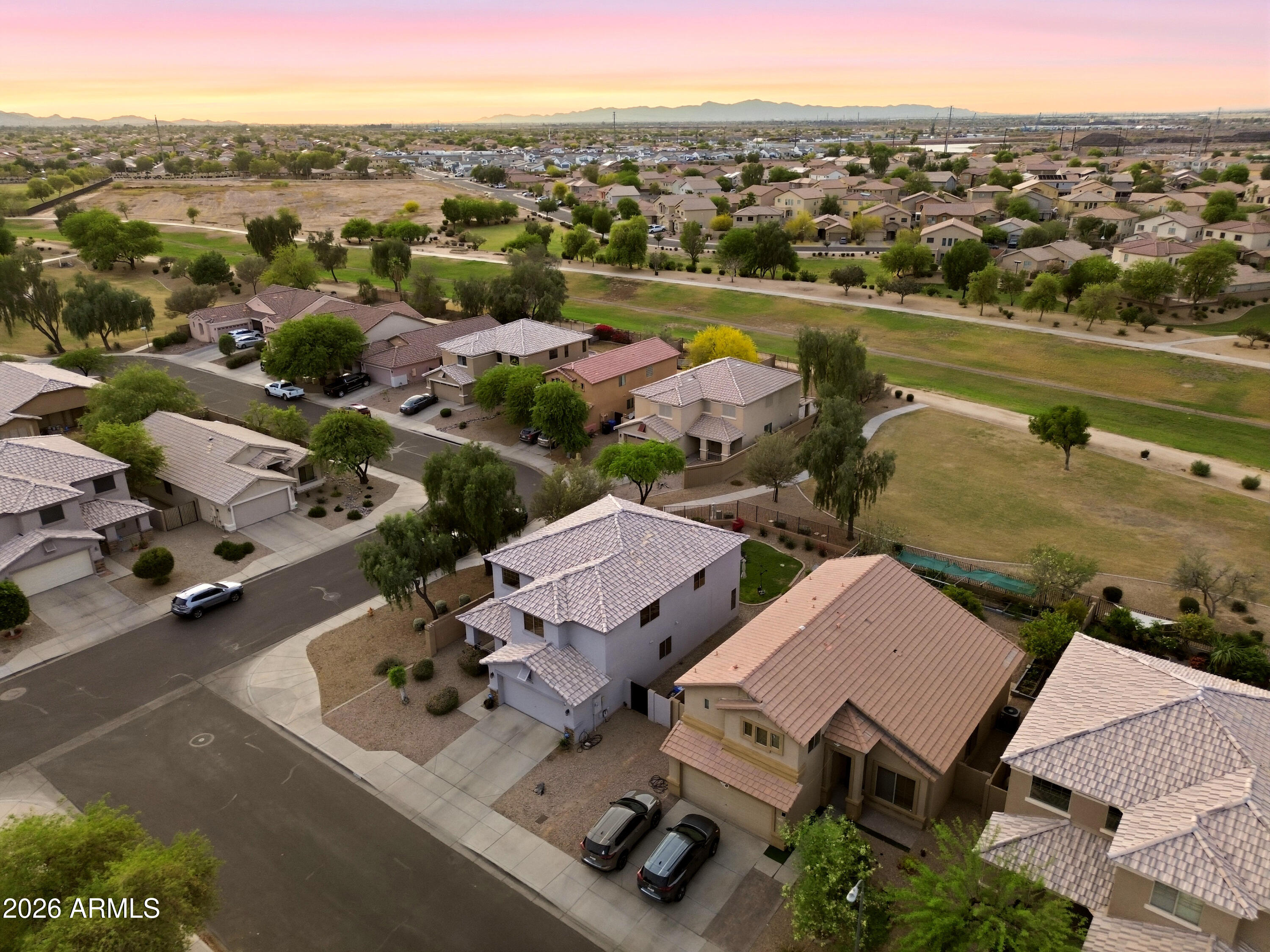 4372 West Alta Vista Road Laveen, AZ 85339 - Photo 13 of 47 an aerial view of a city with lots of residential buildings
