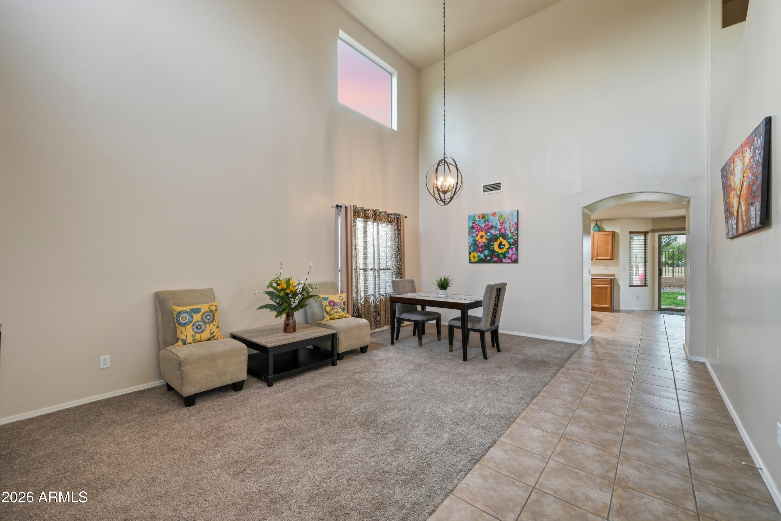 4372 West Alta Vista Road Laveen, AZ 85339 - Photo 17 of 47 a living room with furniture and a window