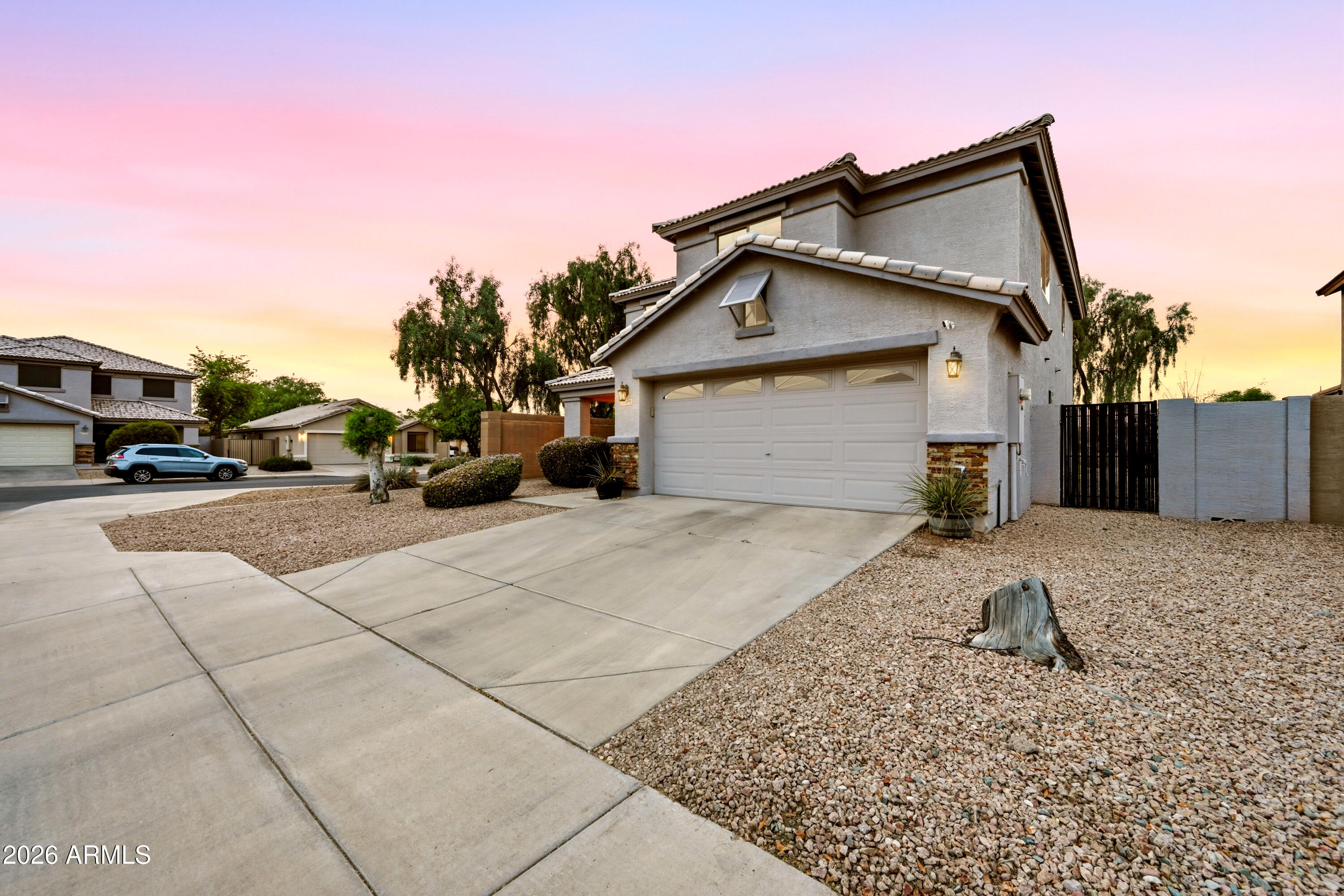 4372 West Alta Vista Road Laveen, AZ 85339 - Photo 3 of 47 a view of a house with a patio