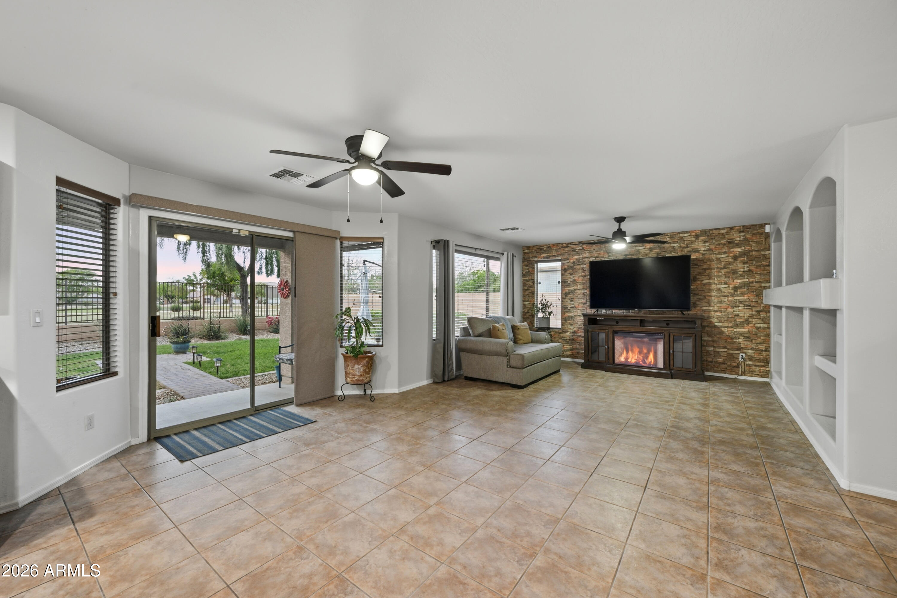 4372 West Alta Vista Road Laveen, AZ 85339 - Photo 41 of 47 a living room with furniture and a flat screen tv