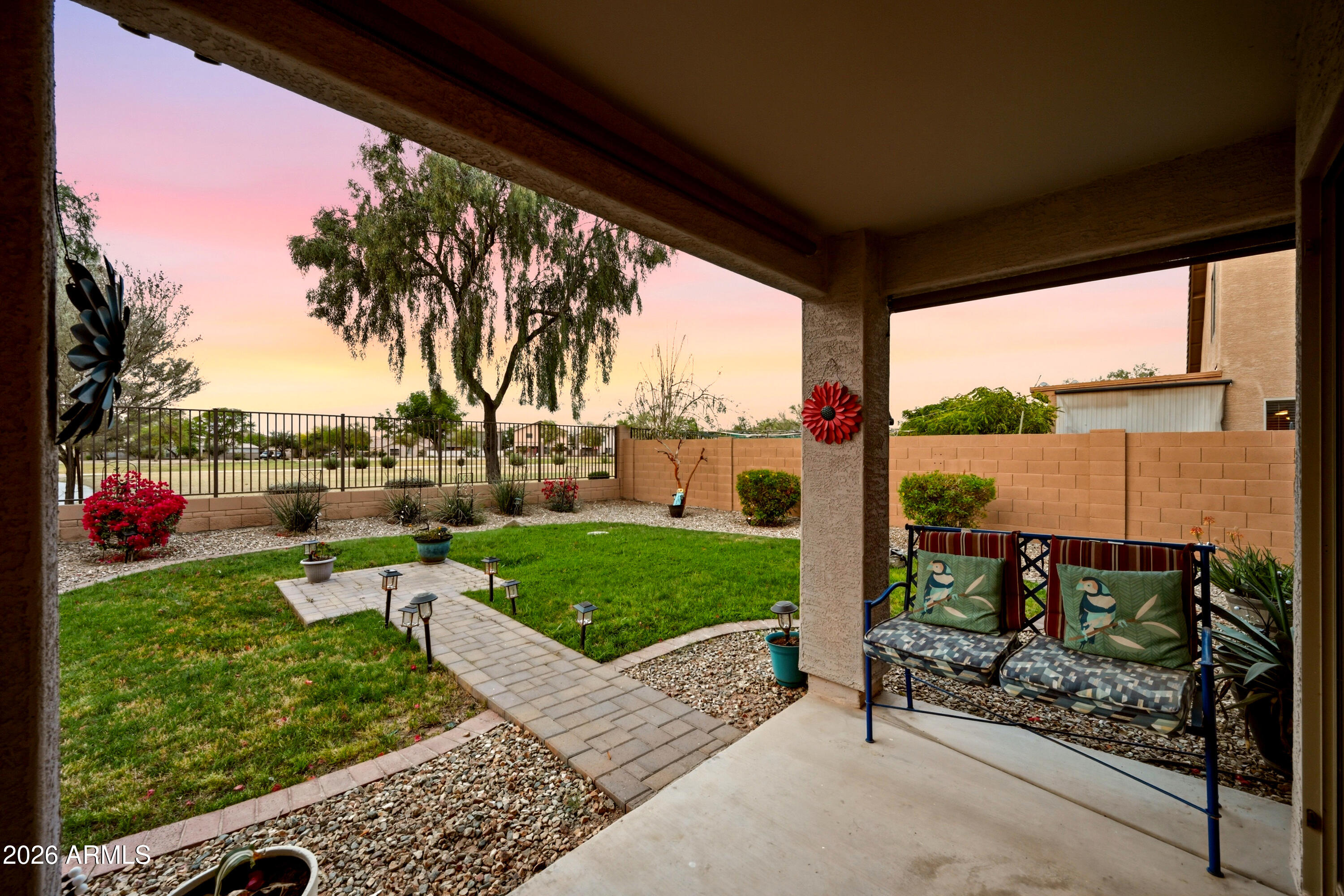 4372 West Alta Vista Road Laveen, AZ 85339 - Photo 7 of 47 a view of a couches in patio with a yard