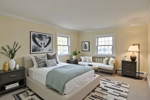 a bedroom with bed and window