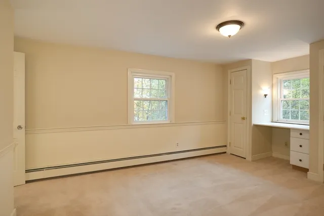 an empty room with windows