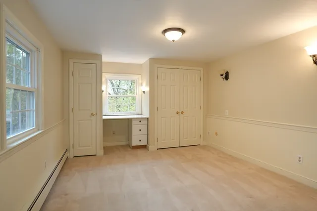 an empty room with windows