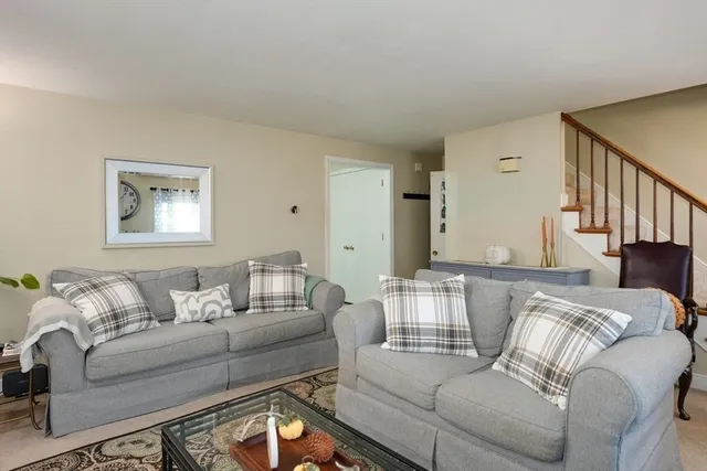 a living room with furniture and a couch