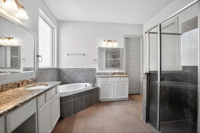 a kitchen with a sink and a refrigerator