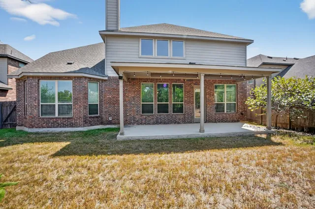 a view of a house with a garden