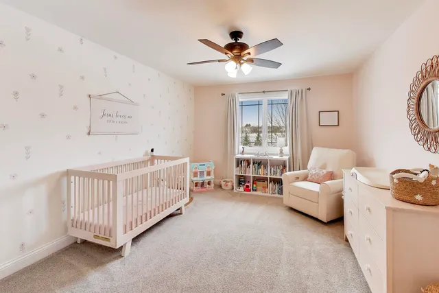 a bedroom with furniture and windows