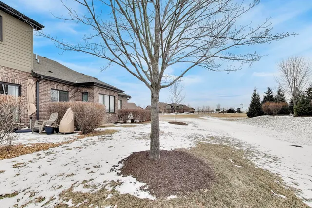 a street view with snow on the road