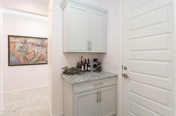 a view of a storage and utility room with closet