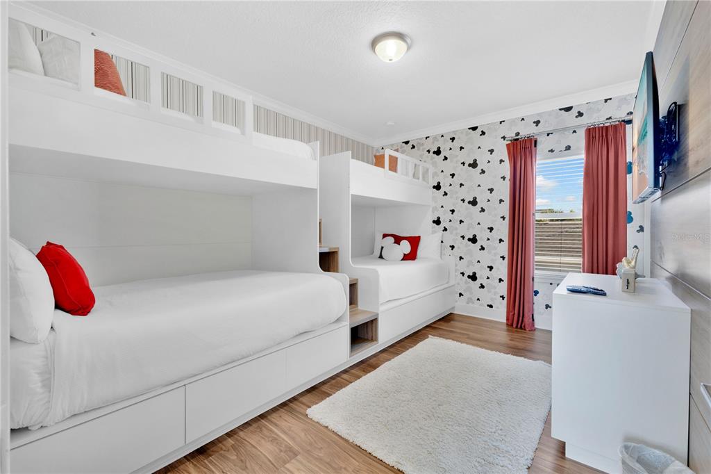 7580 Excitement Drive Reunion, FL 34747 - Photo 22 of 47 a bedroom with a bed and a window