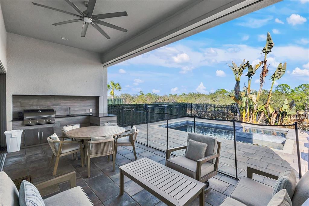 7580 Excitement Drive Reunion, FL 34747 - Photo 34 of 47 a living room with furniture